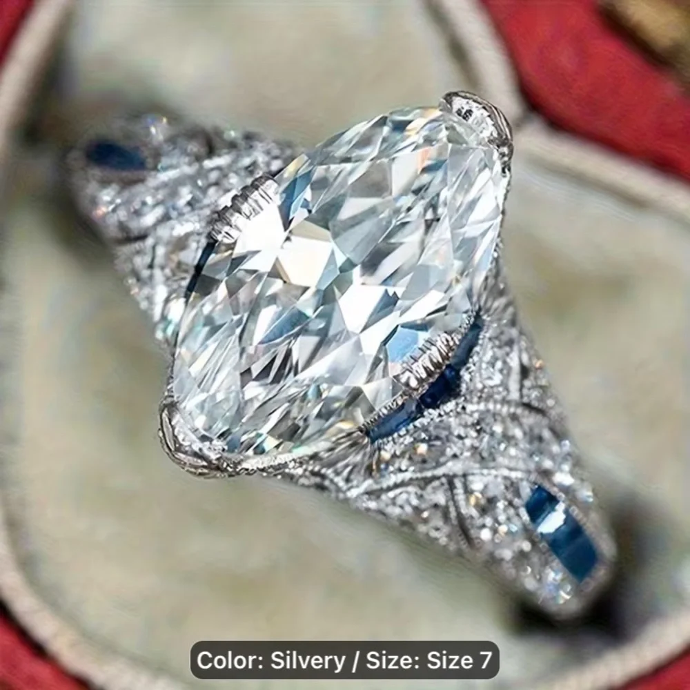 9.25 Sterling Silver Marquise Moissanite Ring with Blue Sapphire Accents - Picture 4 of 4